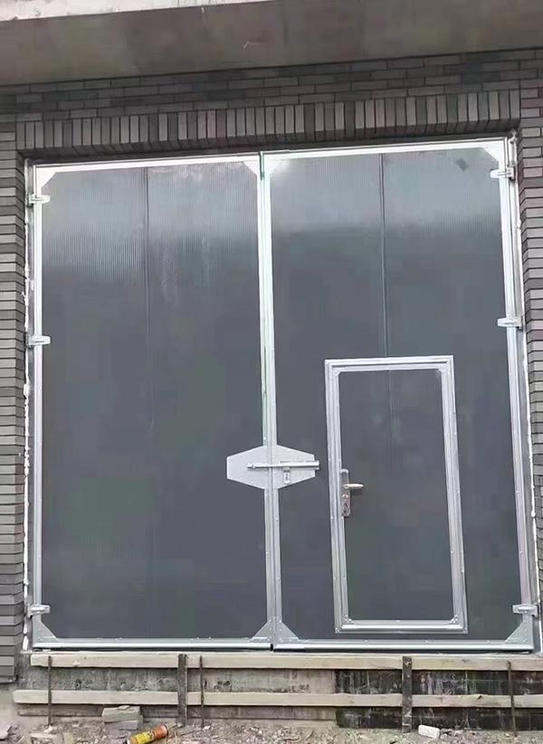 陇南工业平开门在大型设备制造车间的应用实例